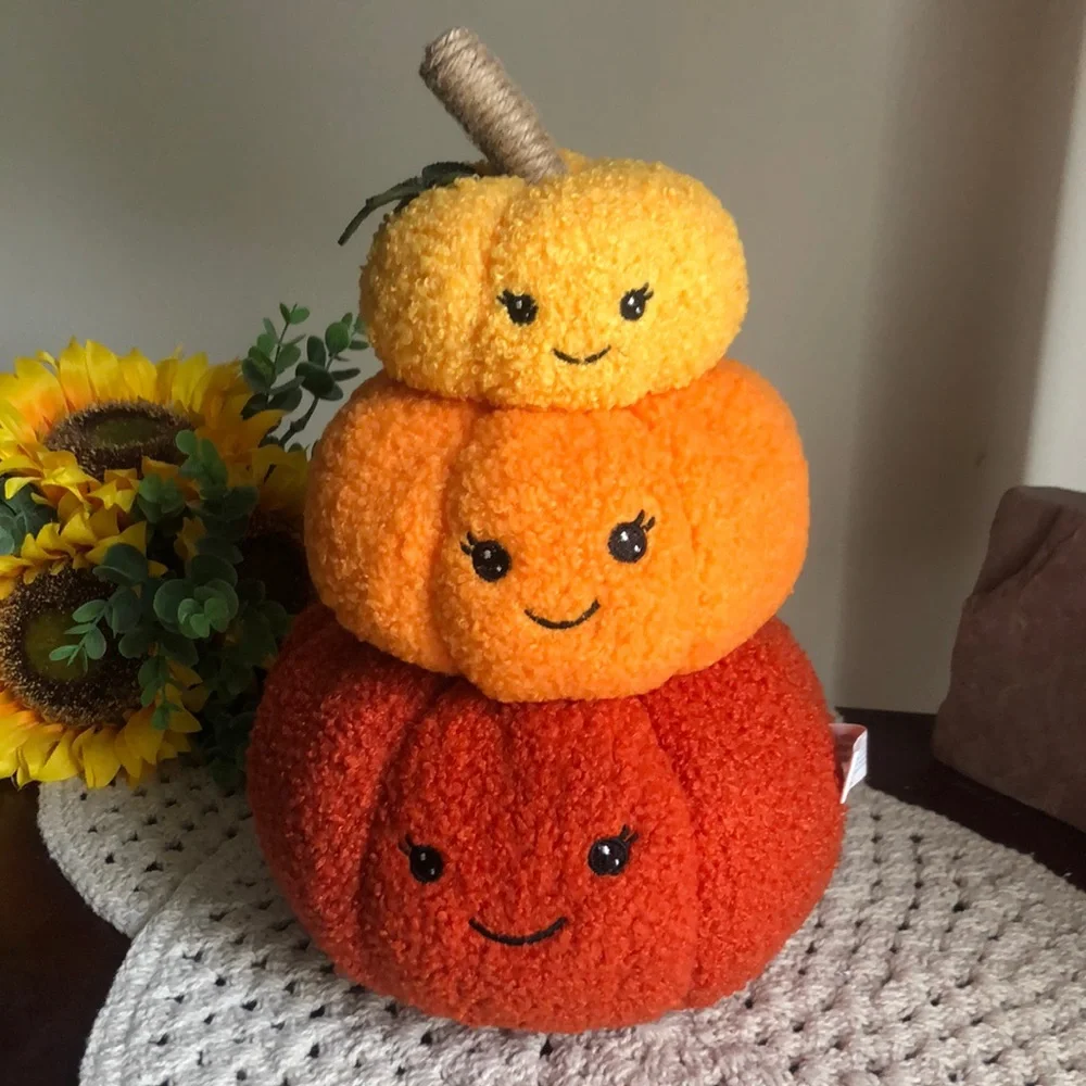 Stacked SHERPA Pumpkins with Smiley Faces